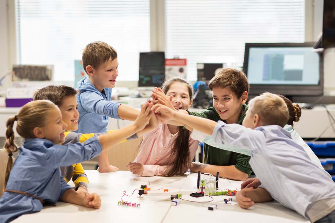 group of children in the classroom working together